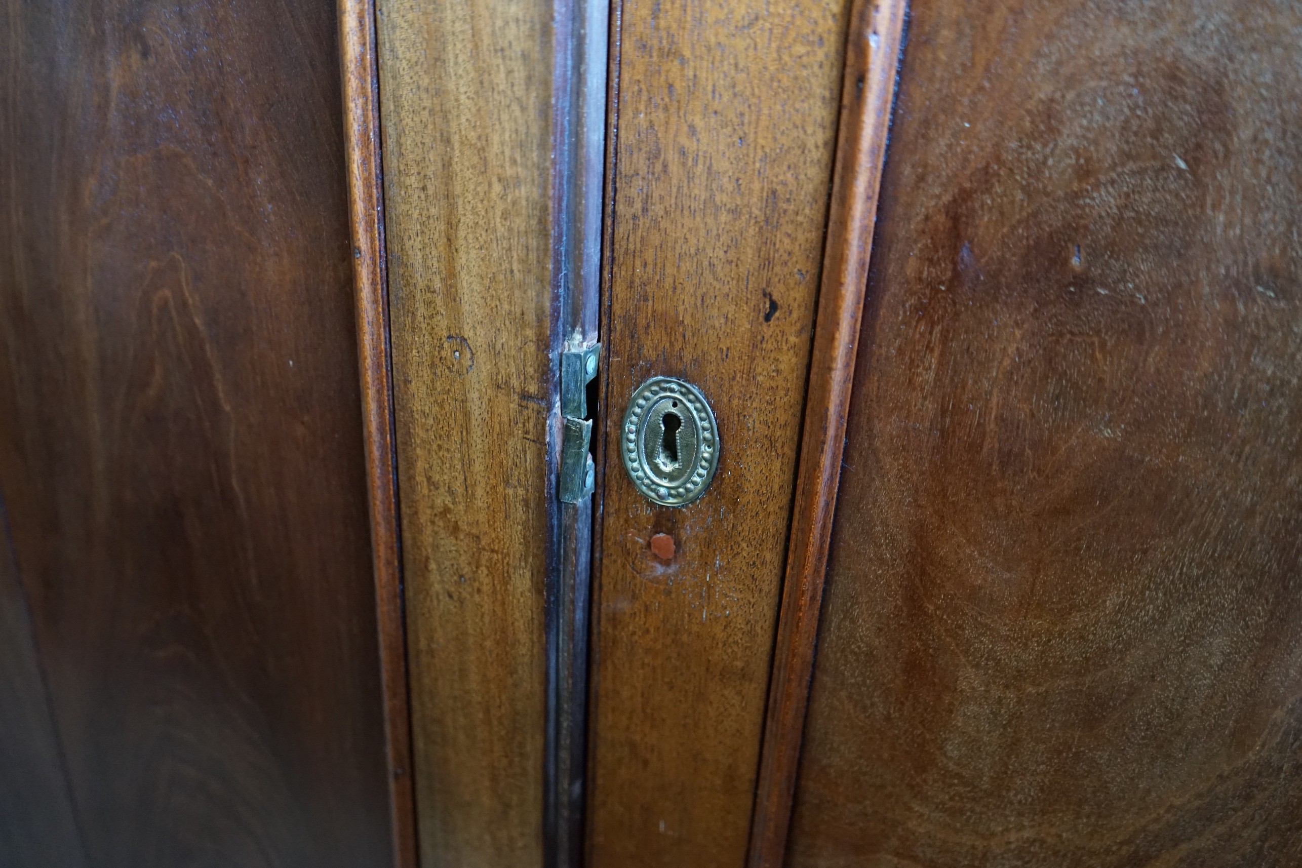 A George III mahogany linen press, width 119cm, depth 59cm, height 175cm